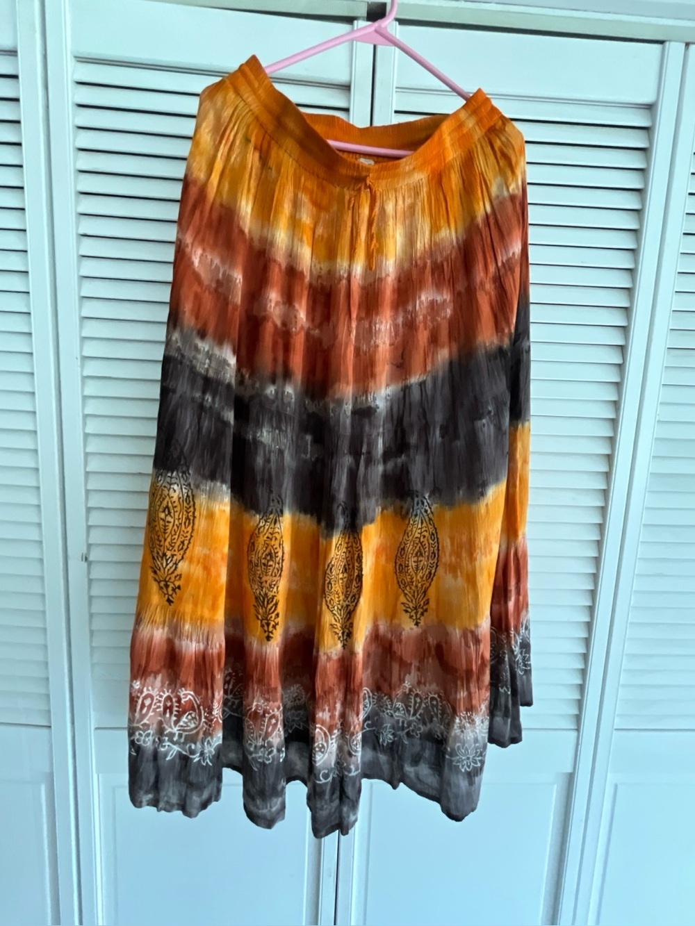 Tiered Tie-Dye Midi Skirt in Mustard and Rust fits most sizes. Elastic waist